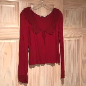 Cranberry colored blouse/ruffled collar/sleeves